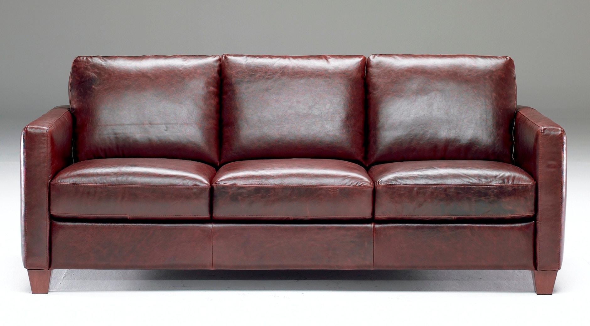 Natuzzi Living Room Track arm Italian Leather Sofa also available as a Queen Sleeper. B591